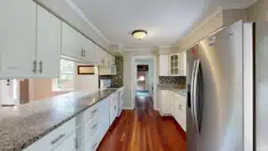 Freshly remodeled kitchen with new cabinets and quartz countertops in Arlington TX home