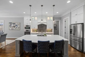 Bright modern kitchen remodel with white cabinets and quartz countertops in Arlington TX home