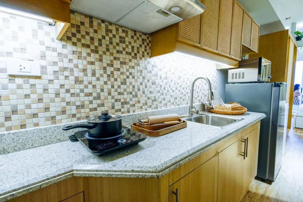 Handmade ceramic backsplash tile installed behind range in Arlington Texas kitchen renovation
