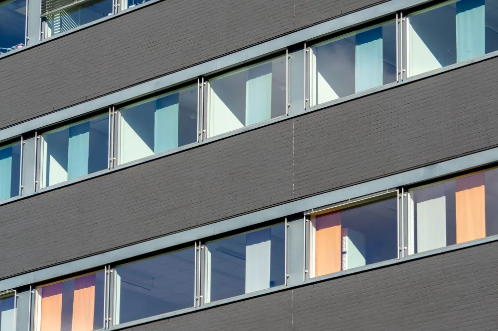 Close-up of low-E glass coating on an energy-efficient replacement window