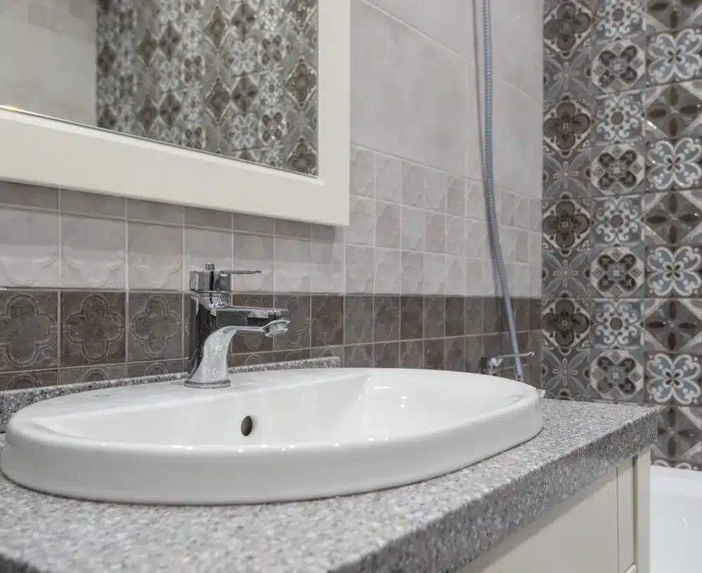Updated bathroom vanity with subway tile and new fixtures during Bedford TX remodel