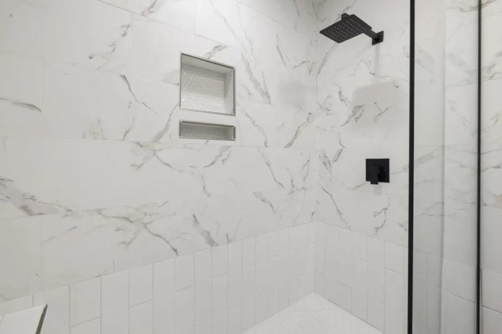 Modern tile vs acrylic shower comparison in an Arlington TX bathroom remodel