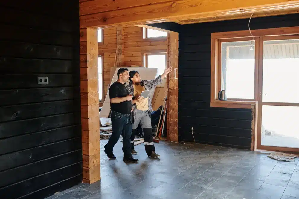 Home remodeling contractor reviewing plans with Arlington TX homeowner during free estimate