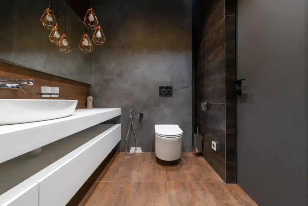 Licensed contractor reviewing bathroom remodel permit plans in Arlington Texas home