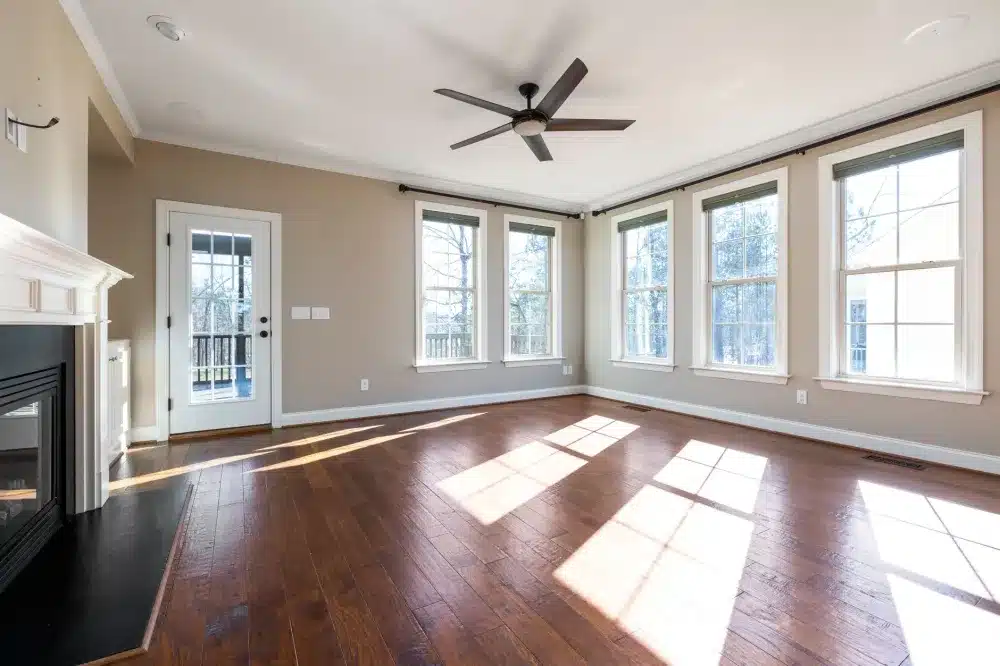Bright living room with newly installed energy efficient replacement windows in Texas