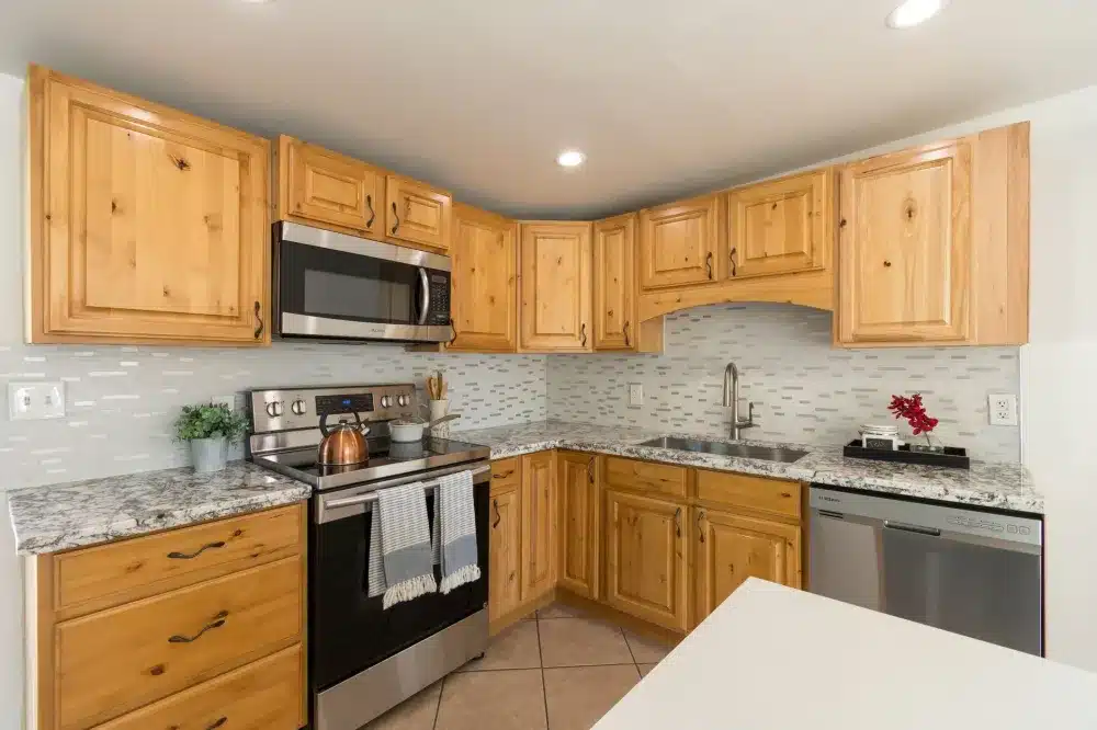 Updated kitchen cabinets and countertops inside a fix-and-flip investment property renovation