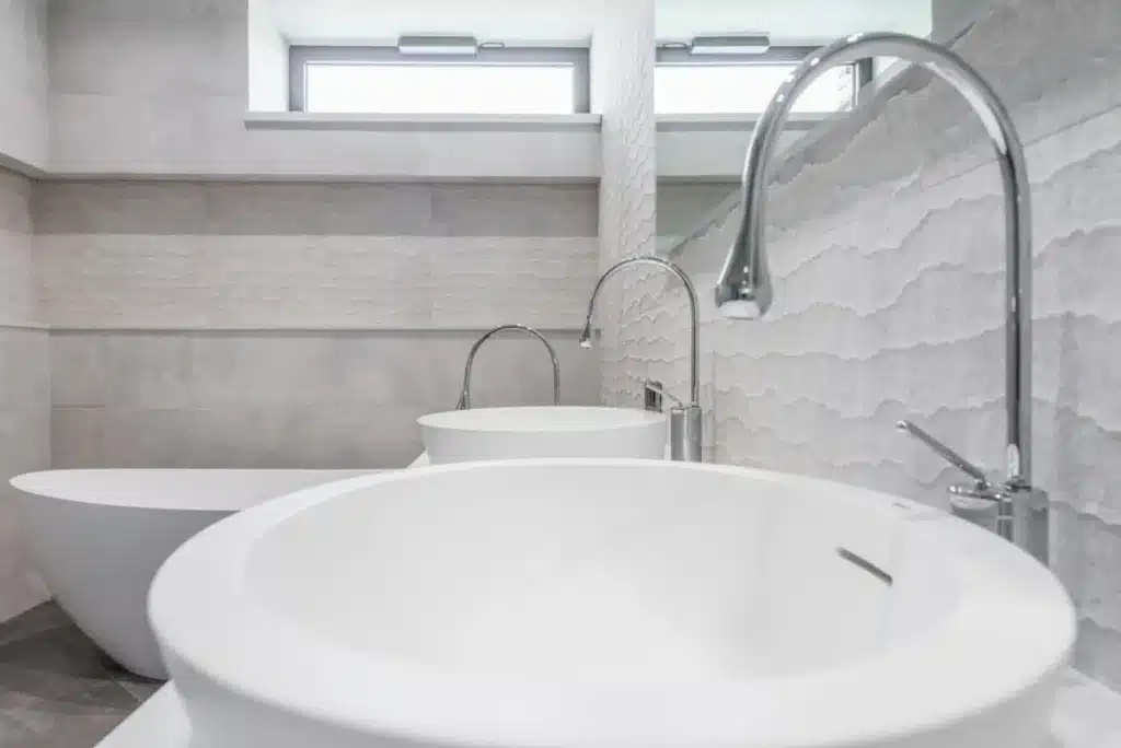 Completed bathroom remodel with walk-in shower and modern vanity in Arlington TX home