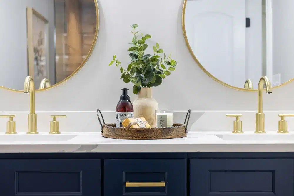 Homeowner choosing quartz vanity countertop and cabinet finish for bathroom remodel