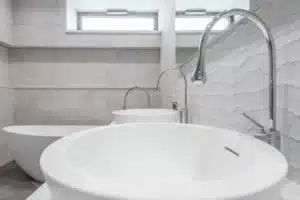 Completed bathroom remodel with walk-in shower and modern vanity in Arlington TX home