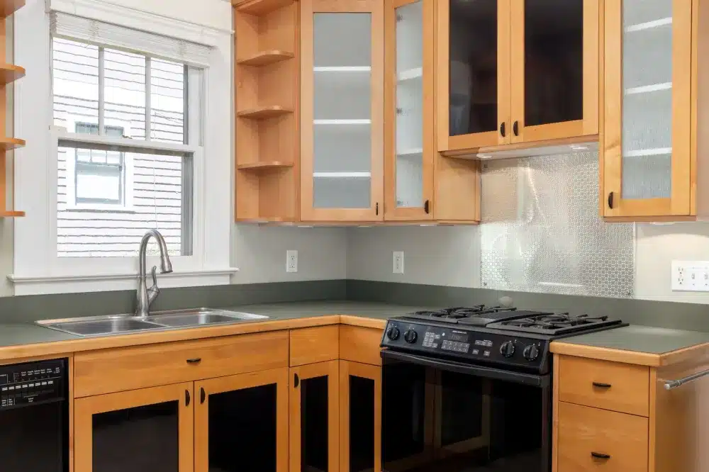 New white shaker cabinets installed during a kitchen remodeling project in Arlington Texas