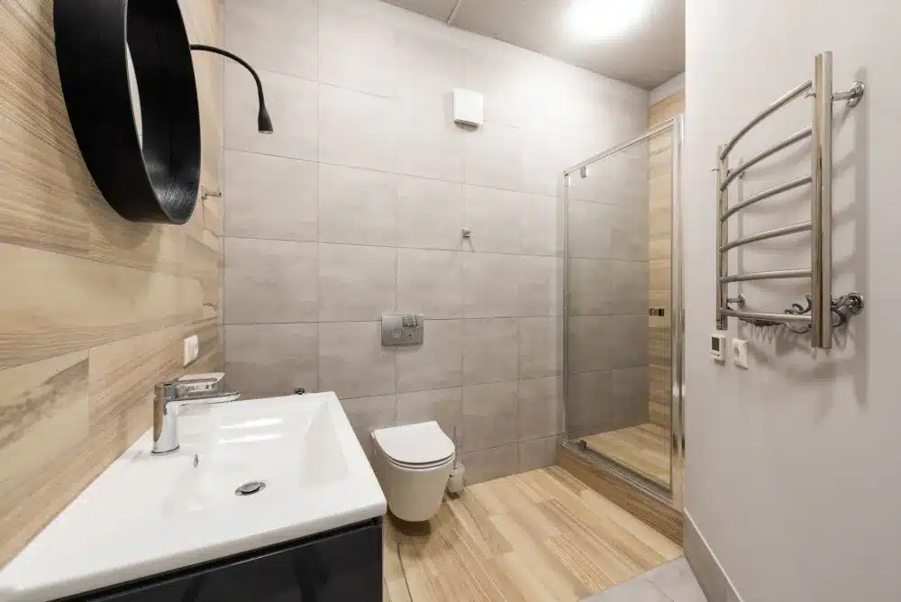 Porcelain tile flooring with radiant heat in a master bathroom remodel near Hurst TX
