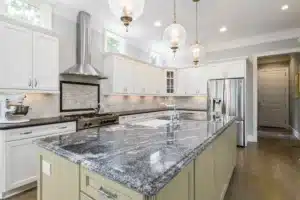 Side-by-side quartz and granite countertops in a modern kitchen remodel in Hurst TX