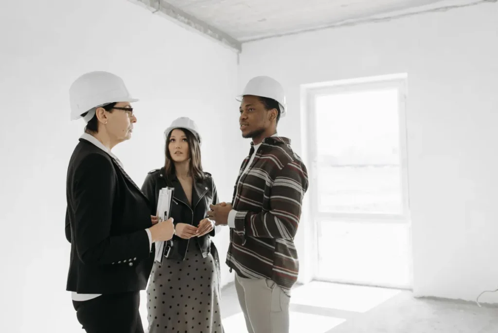 Homeowner asking a remodeling contractor questions during an in-home consultation in Bedford TX