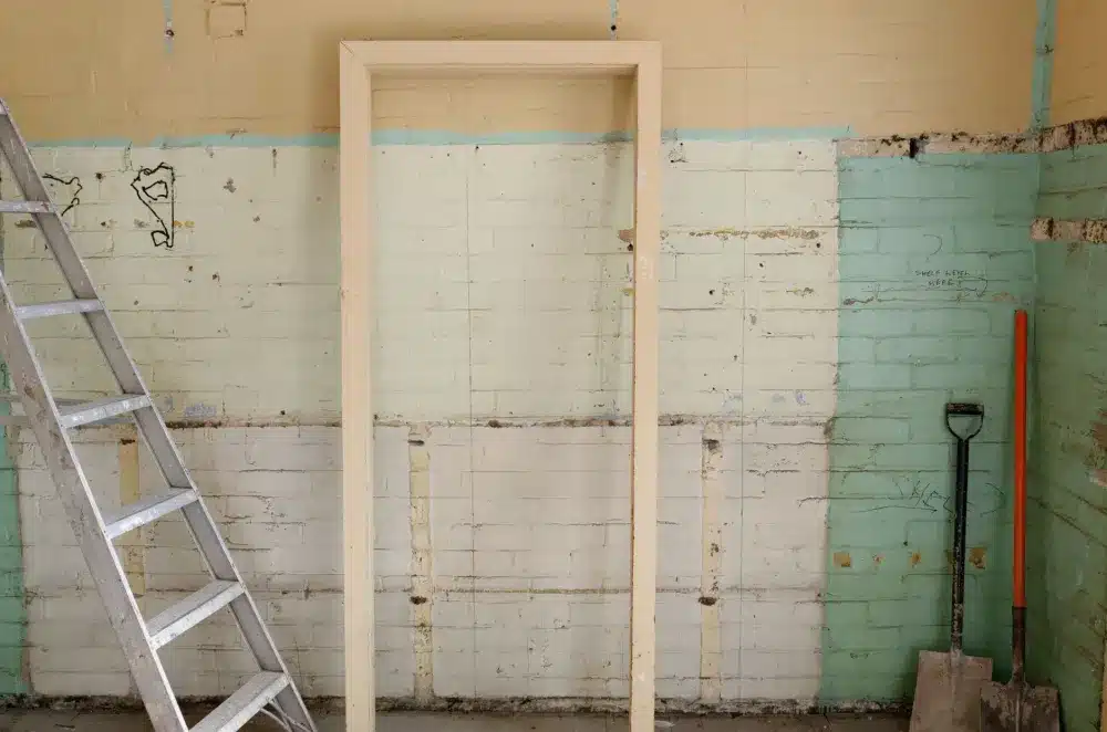 Contractor performing kitchen demolition during a full kitchen remodel in Arlington Texas