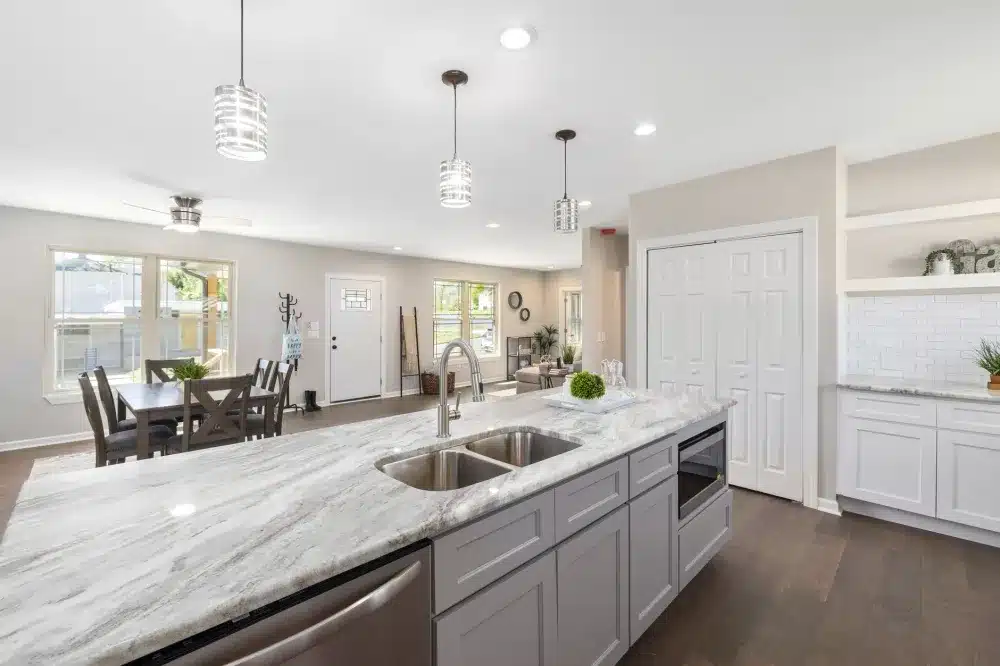 Open concept kitchen and dining area after professional remodel in Arlington TX mid-cities home