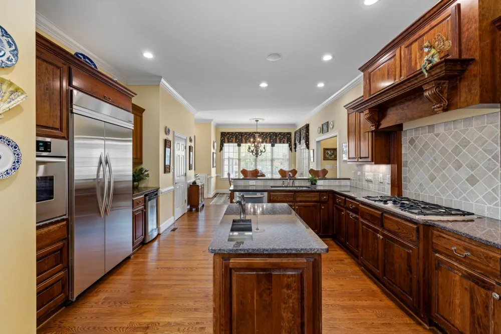 Countertop being installed on a new kitchen island in a North Texas home