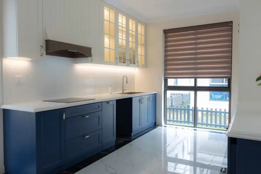 Under-cabinet LED task lighting washing a kitchen countertop in a Fort Worth home