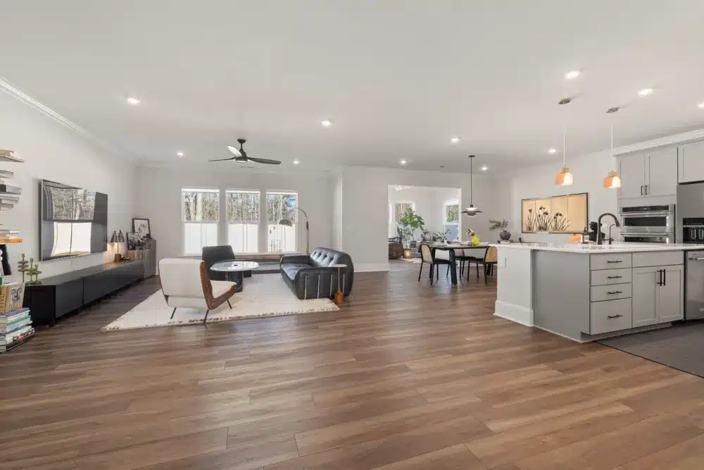 Open-concept kitchen and living room layout in a 1990s DFW ranch home after remodel