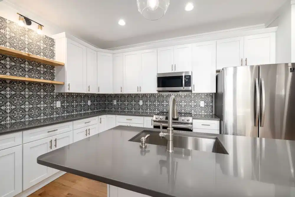 Handmade ceramic tile backsplash installed in a remodeled Bedford TX kitchen