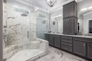 Porcelain tile bathroom floor in a remodeled Arlington, TX slab-foundation home