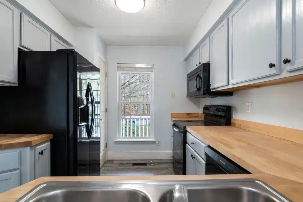 Bright updated kitchen with new cabinets and countertops in an Arlington investment property