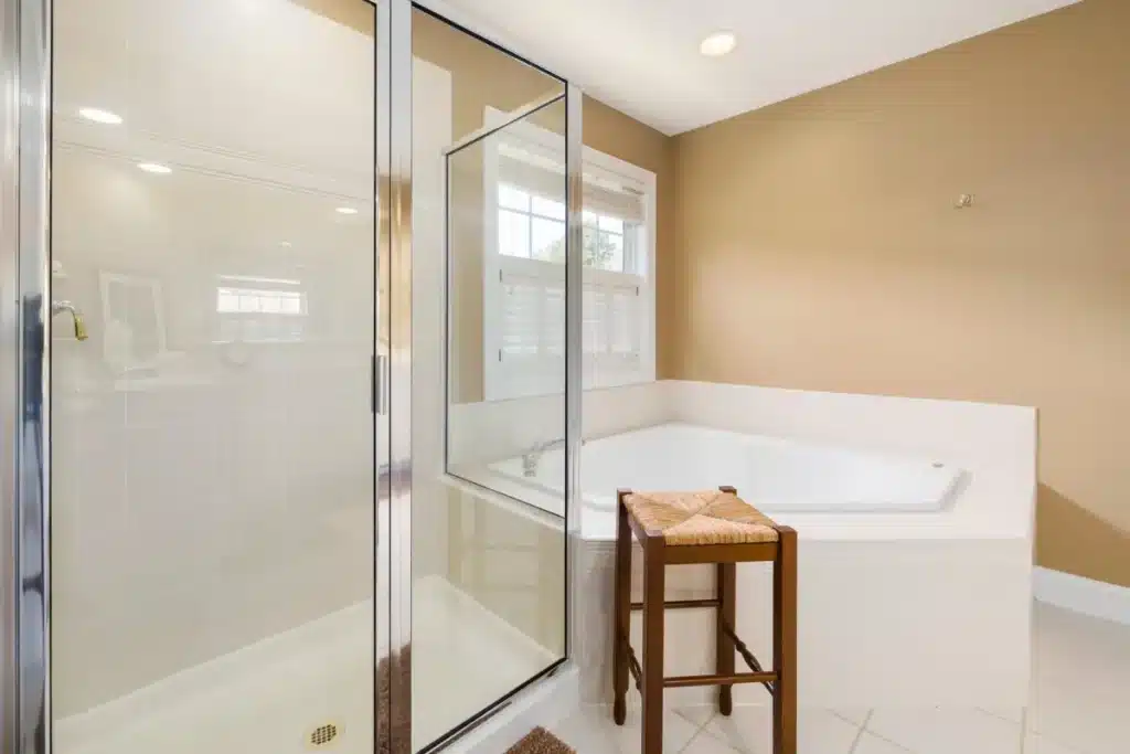 Remodeled bathroom with ceiling exhaust fan in an Arlington home